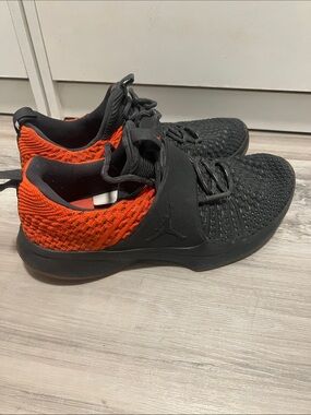Jordan Men’s Black and Orange Low-Top Basketball Sneakers